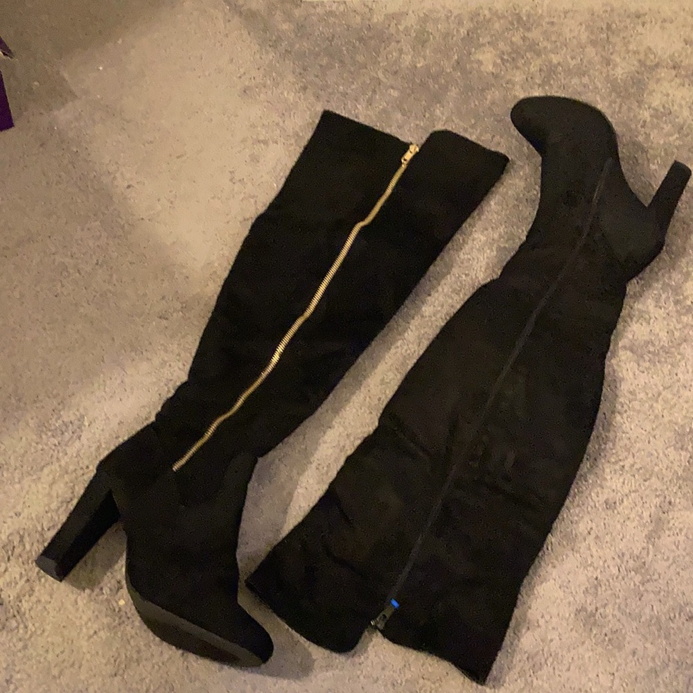 Faux soft suede over the knee boots with a inside zipper.